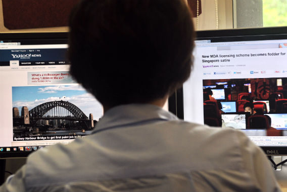 A person browses through media websites on a computer on May 30,